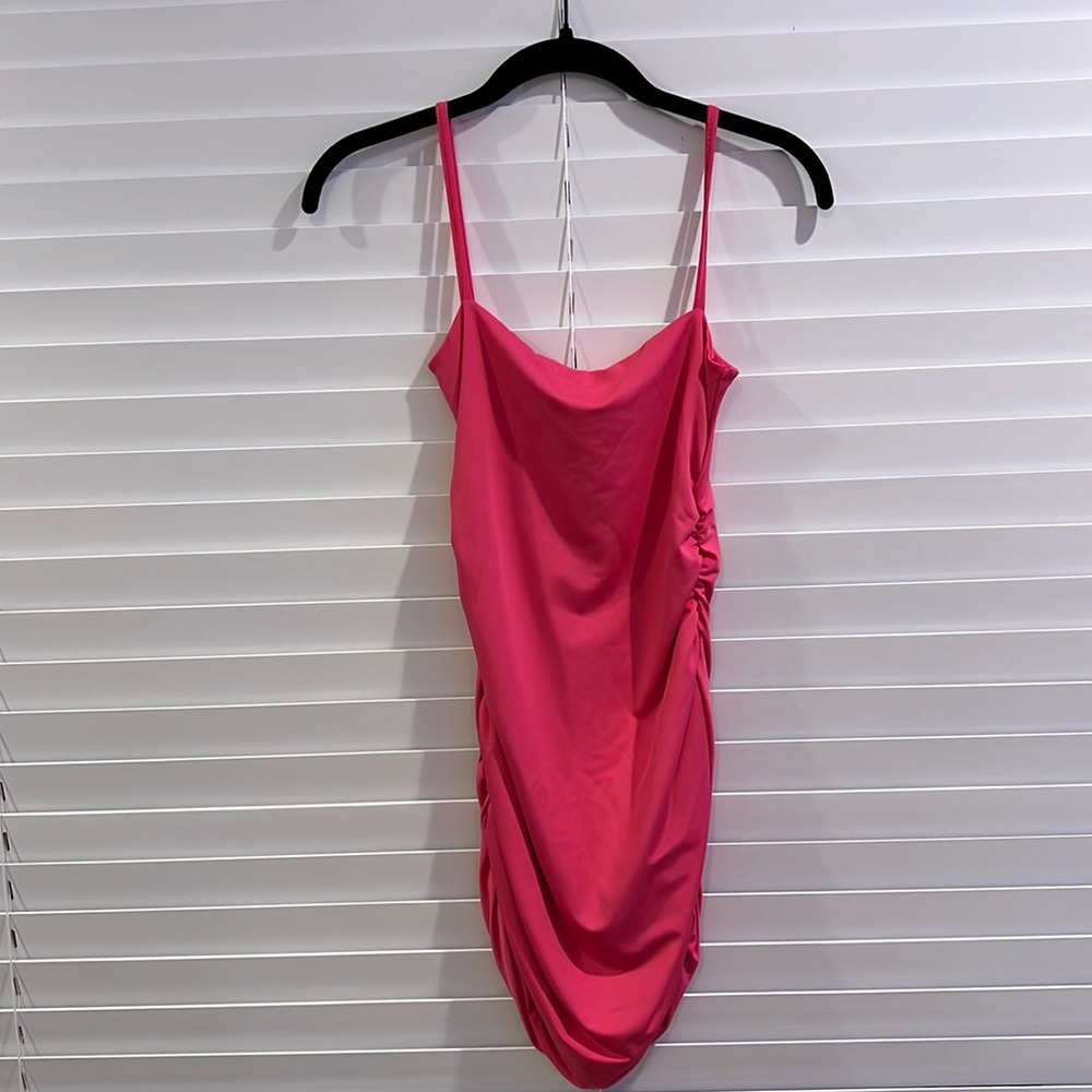 Pink shein dress. Never worn stretchy and comfortable.